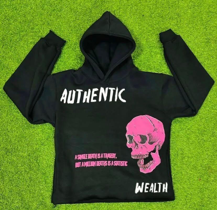 Black pullover hoodie with white text and pink skull graphic print