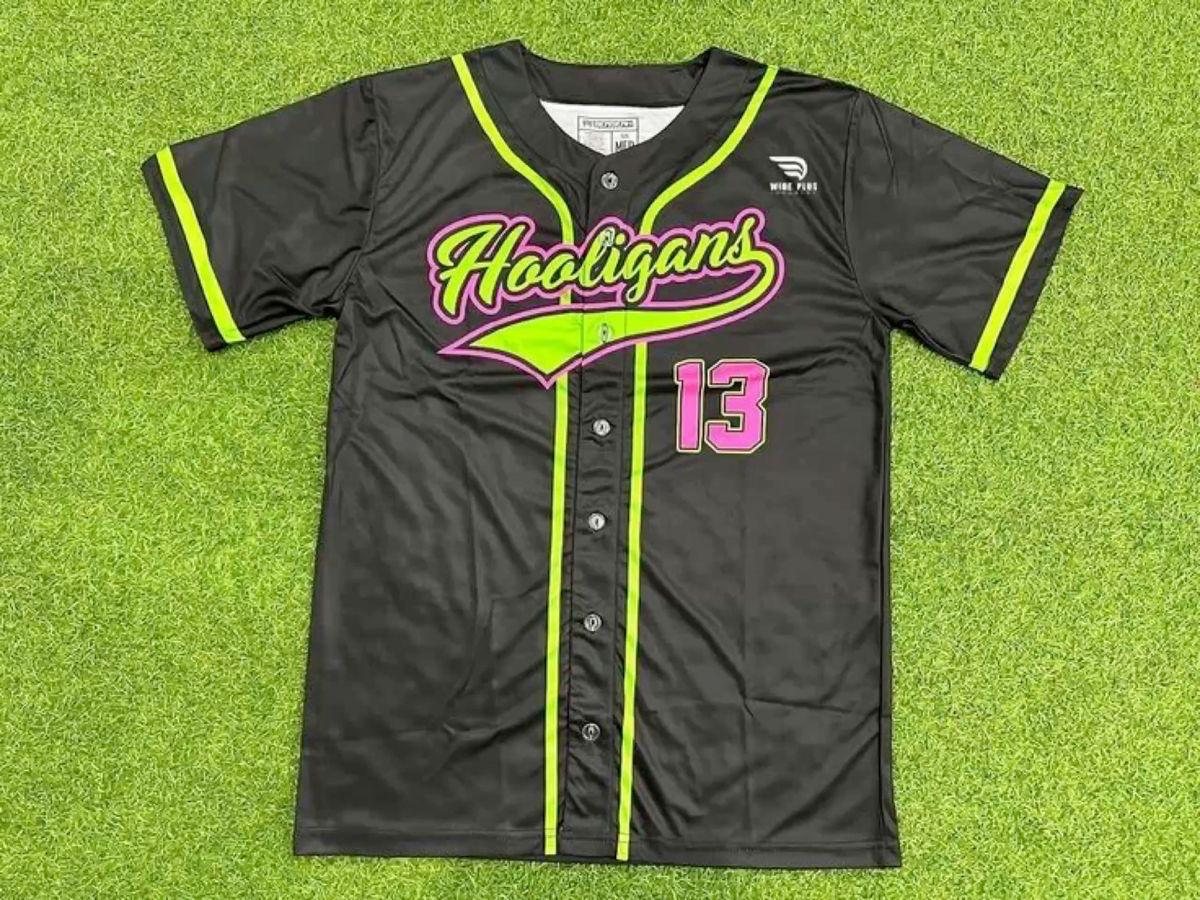 Custom black baseball jersey with neon green piping and script branding