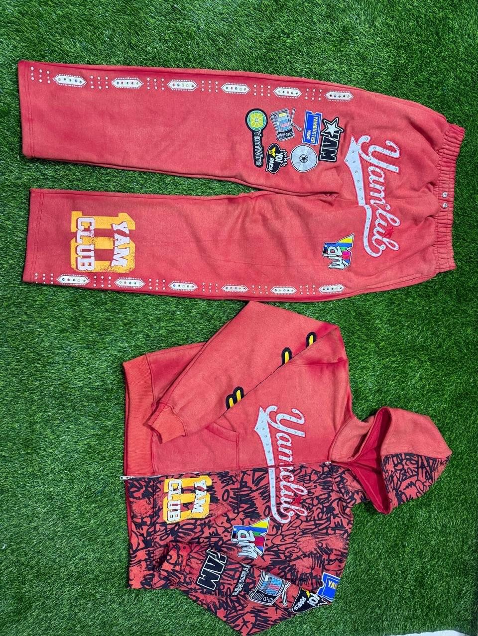 Custom graphic zip hoodie and sweatpants with patches across colorways detail 2