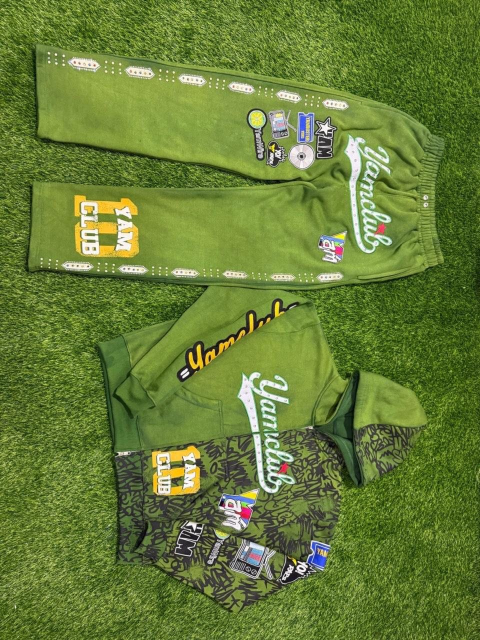 Custom graphic zip hoodie and sweatpants with patches across colorways detail 3